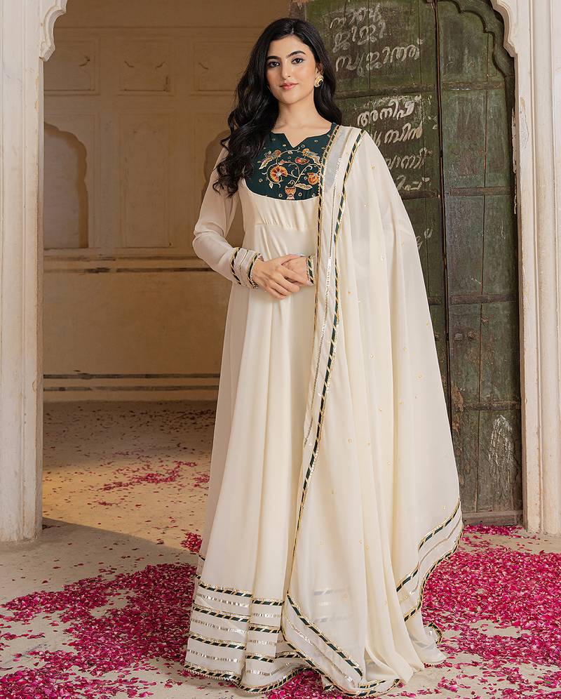 Elegant off white anarkali suit with matching embroidered dupatta detailing