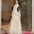 Elegant off white anarkali suit with matching embroidered dupatta detailing