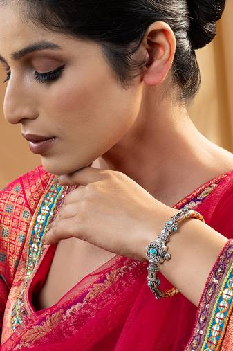 Turquoise accents silver kada