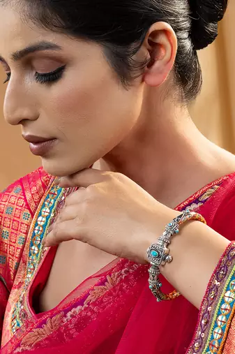 Turquoise accents silver kada