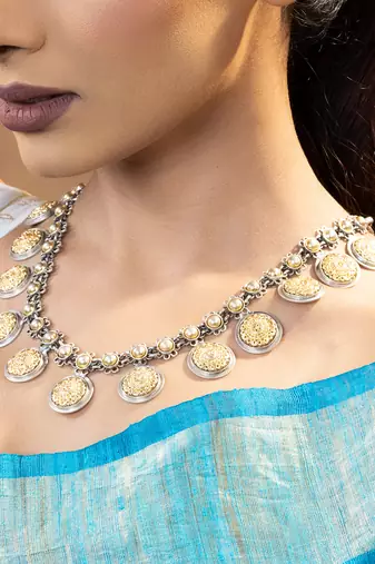 Golden charm silver necklace