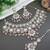 Gold plated traditional kundan & pearl drop bridal necklace with earrings & maang tikka jewellery set for women (pink)