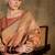charming peach banarasi art silk saree with weaving work 