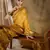 vibrant mustard banarasi art silk saree with weaving work 