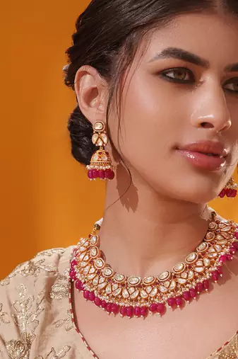 Gold plated red stone kundan necklace set