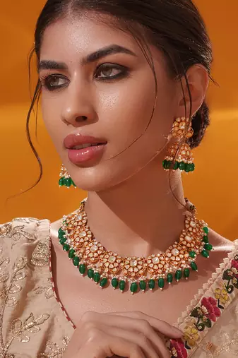 Gold plated green stone kundan necklace set