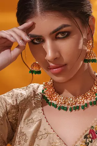 Gold plated green stone kundan necklace set