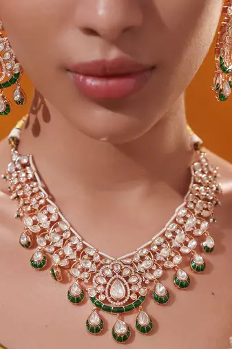 Gold plated green stone kundan necklace set