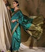 striking teal banarasi art silk saree with weaving work 
