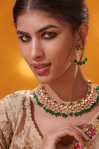 Gold plated green stone kundan necklace set