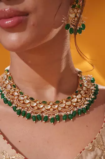 Gold plated green stone kundan necklace set
