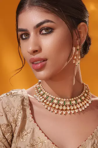 Gold plated green stone kundan necklace set