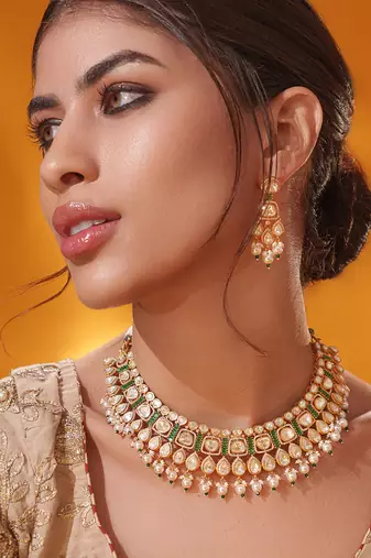 Gold plated green stone kundan necklace set