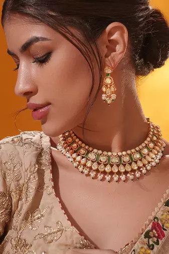 Gold plated green stone kundan necklace set