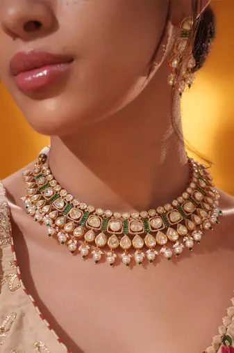 Gold plated green stone kundan necklace set