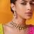 Gold plated green stone kundan necklace set