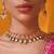 Gold plated green stone kundan necklace set