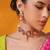 Gold plated red stone kundan necklace set