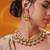 Gold plated green stone kundan necklace set