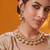 Gold plated green stone kundan necklace set