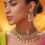 Gold plated green stone kundan necklace set
