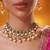 Gold plated green stone kundan necklace set