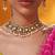 Gold plated green stone kundan necklace set
