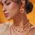 Gold plated red stone kundan necklace set