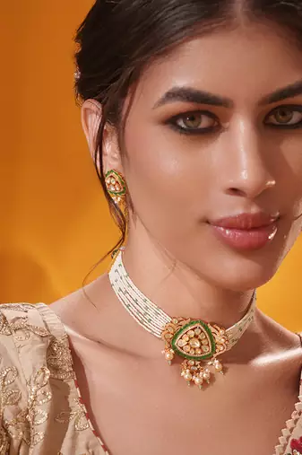 Gold plated green stone kundan necklace set