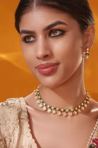 Gold plated green stone kundan necklace set