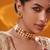 Gold plated green stone kundan necklace set