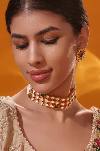 Gold plated green stone kundan necklace set