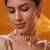 Gold plated green stone kundan necklace set