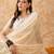 Off white cotton jacquard saree with intricate weaving work