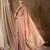 peach banarasi art silk saree with delicate weaving details 