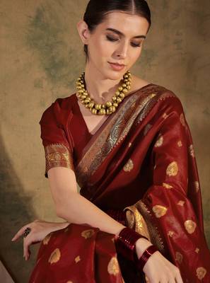 maroon banarasi art silk saree with regal weaving highlights  4