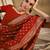 bright red banarasi art silk saree with statement weaving work 
