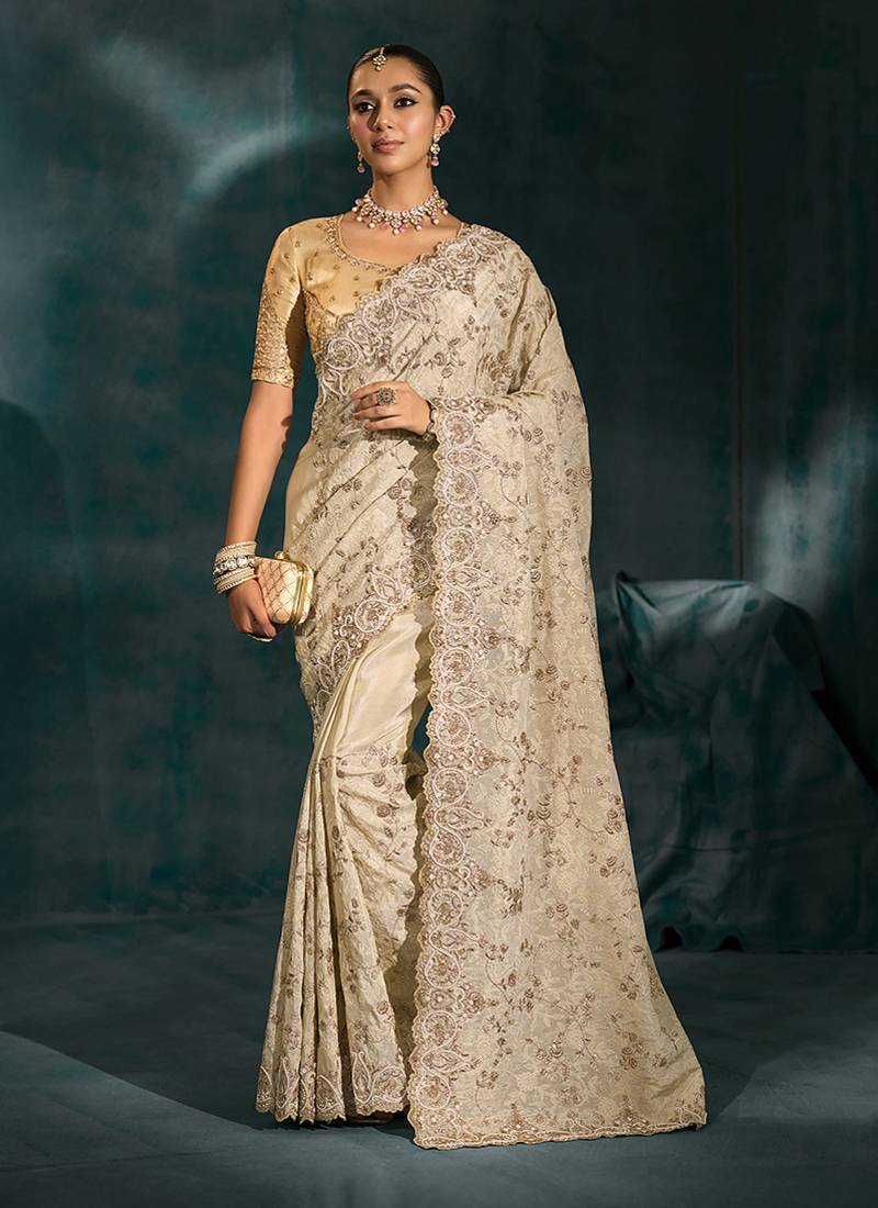 Cream embroidered silk blend contemporary saree for engagement