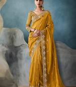 Mustard tissue embroidered sequins and zari work saree