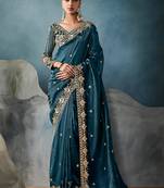 Teal tissue embroidered sequins and zari work saree