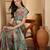 Mint green floral print linen zari saree with belt digital print zari border designer saree