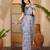 Elegant linen silver zari blue floral digital print saree with belt & tassel detail party wear