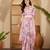 Baby pink linen silver zari saree with belt bold floral digital print & latkan tassel pallu