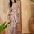 Elegant linen silver zari digital print saree with tassel pallu & designer belt