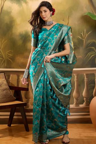 teal banarasi jacquard saree with rich zari weaving, mina & lace work on pallu