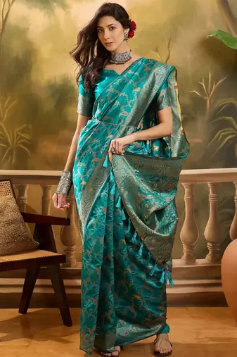 teal banarasi jacquard saree with rich zari weaving, mina & lace work on pallu
