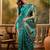 teal banarasi jacquard saree with rich zari weaving, mina & lace work on pallu
