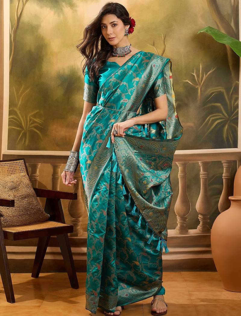 teal banarasi jacquard saree with rich zari weaving, mina & lace work on pallu