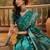 teal banarasi jacquard saree with rich zari weaving, mina & lace work on pallu