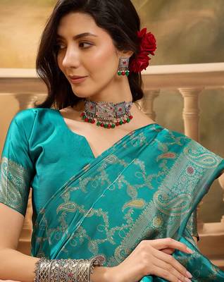 teal banarasi jacquard saree with rich zari weaving, mina & lace work on pallu 5